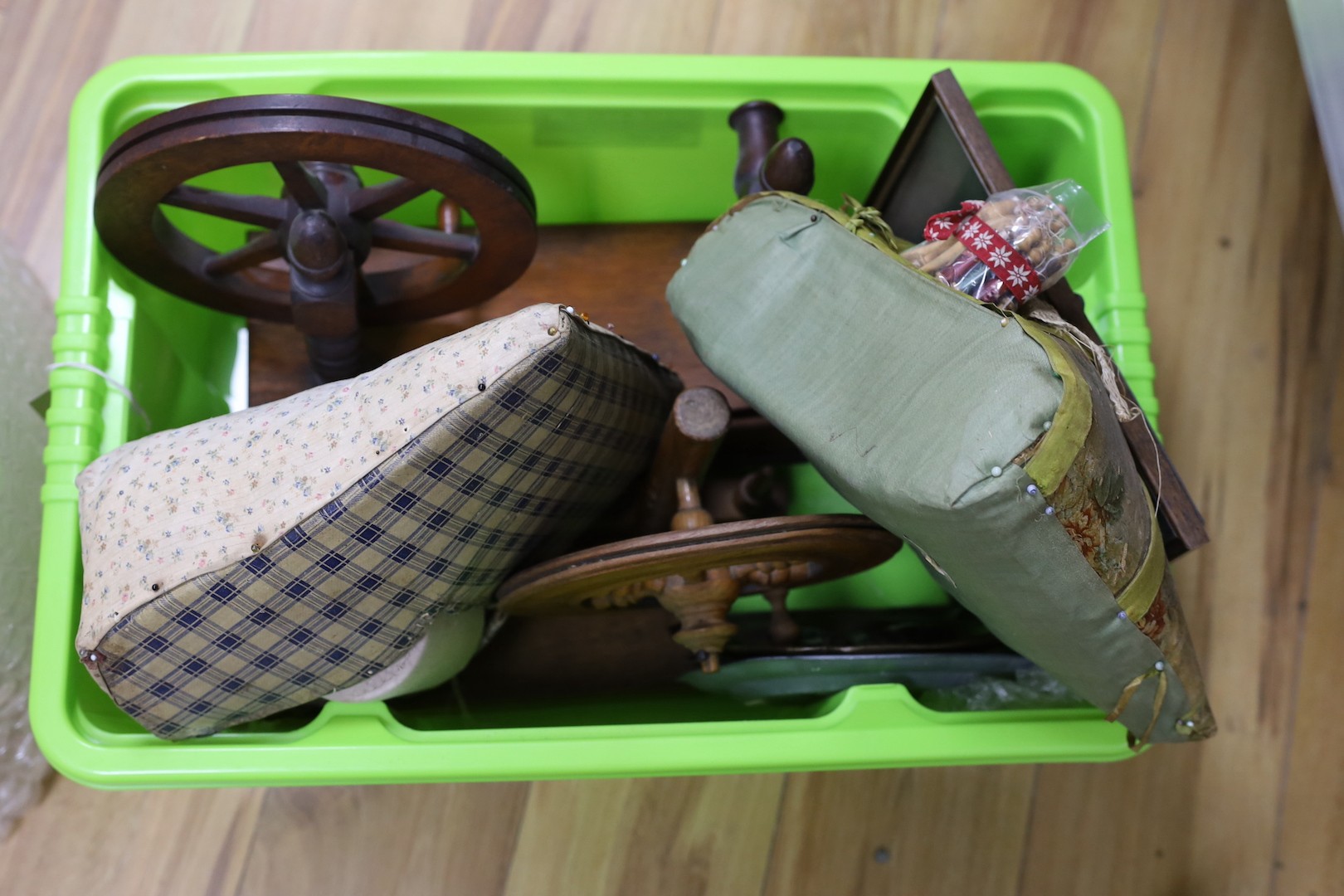 Two lace bobbin winders, two lace-maker's pillows, bobbins, etc